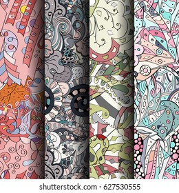 Set of tracery colorful seamless patterns. Curved doodling backgrounds for textile or printing with mehndi and ethnic motives. Vector