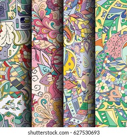Set of tracery colorful seamless patterns. Curved doodling backgrounds for textile or printing with mehndi and ethnic motives. Vector