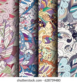 Set of tracery colorful seamless patterns. Curved doodling backgrounds for textile or printing with mehndi and ethnic motives. Vector