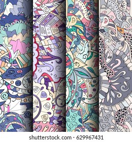 Set of tracery colorful seamless patterns. Curved doodling backgrounds for textile or printing with mehndi and ethnic motives. Vector