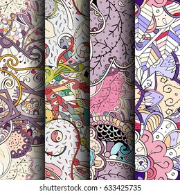 Set of tracery colorful seamless patterns. Curved doodling backgrounds for textile or printing with mehndi and ethnic motives. Vector