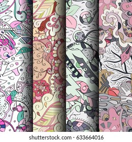 Set of tracery colorful seamless patterns. Curved doodling backgrounds for textile or printing with mehndi and ethnic motives. Vector
