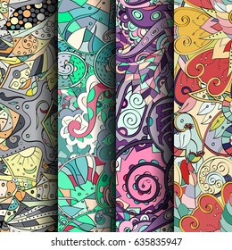 Set of tracery colorful seamless patterns. Vertical stripes. Curved doodling backgrounds for textile or printing with mehndi and ethnic motives. Vector