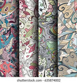 Set of tracery colorful seamless patterns. Vertical stripes. Curved doodling backgrounds for textile or printing with mehndi and ethnic motives. Vector