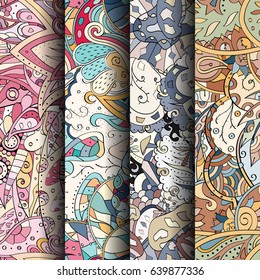 Set of tracery colorful seamless patterns. Vertical stripes. Curved doodling backgrounds for textile or printing with mehndi and ethnic motives. Vector