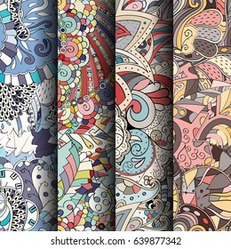 Set of tracery colorful seamless patterns. Vertical stripes. Curved doodling backgrounds for textile or printing with mehndi and ethnic motives. Vector