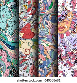 Set of tracery colorful seamless patterns. Vertical stripes. Curved doodling backgrounds for textile or printing with mehndi and ethnic motives. Vector