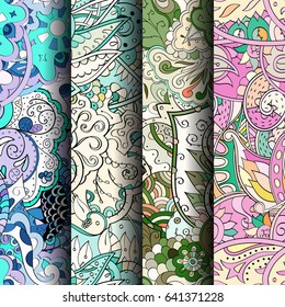 Set of tracery colorful seamless patterns. Vertical stripes. Curved doodling backgrounds for textile or printing with mehndi and ethnic motives. Vector