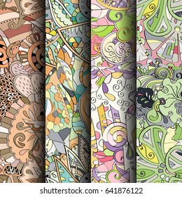 Set of tracery colorful seamless patterns. Vertical stripes. Curved doodling backgrounds for textile or printing with mehndi and ethnic motives. Vector