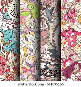 Set of tracery colorful seamless patterns. Vertical stripes. Curved doodling backgrounds for textile or printing with mehndi and ethnic motives. Vector