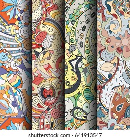 Set of tracery colorful seamless patterns. Vertical stripes. Curved doodling backgrounds for textile or printing with mehndi and ethnic motives. Vector