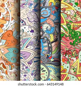 Set of tracery colorful seamless patterns. Vertical stripes. Curved doodling backgrounds for textile or printing with mehndi and ethnic motives. Vector