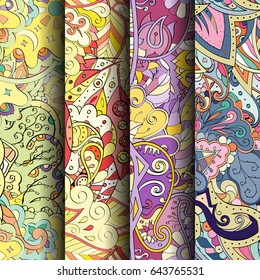Set of tracery colorful seamless patterns. Vertical stripes. Curved doodling backgrounds for textile or printing with mehndi and ethnic motives. Vector