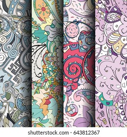 Set of tracery colorful seamless patterns. Vertical stripes. Curved doodling backgrounds for textile or printing with mehndi and ethnic motives. Vector