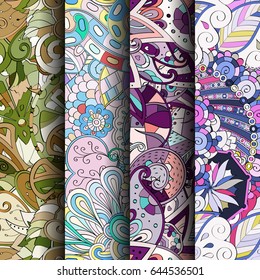 Set of tracery colorful seamless patterns. Vertical stripes. Curved doodling backgrounds for textile or printing with mehndi and ethnic motives. Vector