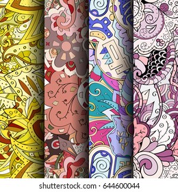 Set of tracery colorful seamless patterns. Vertical stripes. Curved doodling backgrounds for textile or printing with mehndi and ethnic motives. Vector