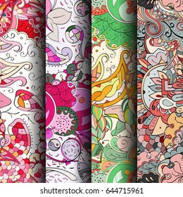 Set of tracery colorful seamless patterns. Vertical stripes. Curved doodling backgrounds for textile or printing with mehndi and ethnic motives. Vector