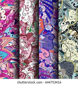 Set of tracery colorful seamless patterns. Vertical stripes. Curved doodling backgrounds for textile or printing with mehndi and ethnic motives. Vector