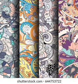 Set of tracery colorful seamless patterns. Vertical stripes. Curved doodling backgrounds for textile or printing with mehndi and ethnic motives. Vector