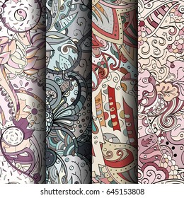 Set of tracery colorful seamless patterns. Vertical stripes. Curved doodling backgrounds for textile or printing with mehndi and ethnic motives. Vector