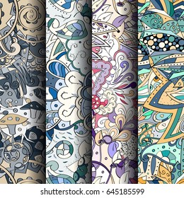 Set of tracery colorful seamless patterns. Vertical stripes. Curved doodling backgrounds for textile or printing with mehndi and ethnic motives. Vector