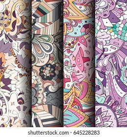 Set of tracery colorful seamless patterns. Vertical stripes. Curved doodling backgrounds for textile or printing with mehndi and ethnic motives. Vector
