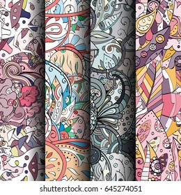 Set of tracery colorful seamless patterns. Vertical stripes. Curved doodling backgrounds for textile or printing with mehndi and ethnic motives. Vector