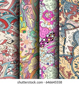 Set of tracery colorful seamless patterns. Vertical stripes. Curved doodling backgrounds for textile or printing with mehndi and ethnic motives. Vector