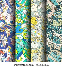 Set of tracery colorful seamless patterns. Vertical stripes. Curved doodling backgrounds for textile or printing with mehndi and ethnic motives. Vector