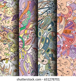 Set of tracery colorful seamless patterns. Vertical stripes. Curved doodling backgrounds for textile or printing with mehndi and ethnic motives. Vector