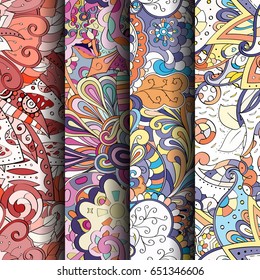 Set of tracery colorful seamless patterns. Vertical stripes. Curved doodling backgrounds for textile or printing with mehndi and ethnic motives. Vector
