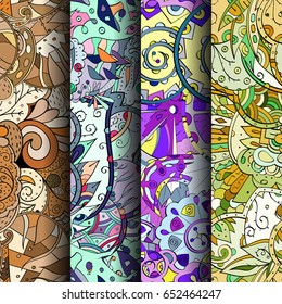 Set of tracery colorful seamless patterns. Vertical stripes. Curved doodling backgrounds for textile or printing with mehndi and ethnic motives. Vector