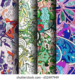 Set of tracery colorful seamless patterns. Vertical stripes. Curved doodling backgrounds for textile or printing with mehndi and ethnic motives. Vector