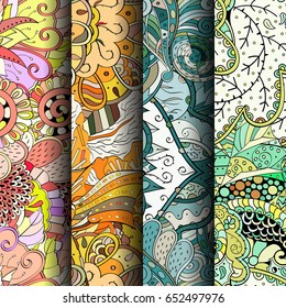 Set of tracery colorful seamless patterns. Vertical stripes. Curved doodling backgrounds for textile or printing with mehndi and ethnic motives. Vector