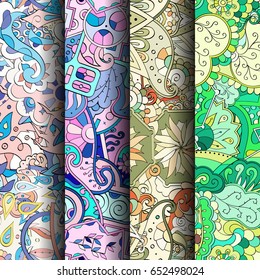 Set of tracery colorful seamless patterns. Vertical stripes. Curved doodling backgrounds for textile or printing with mehndi and ethnic motives. Vector