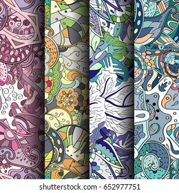 Set of tracery colorful seamless patterns. Vertical stripes. Curved doodling backgrounds for textile or printing with mehndi and ethnic motives. Vector
