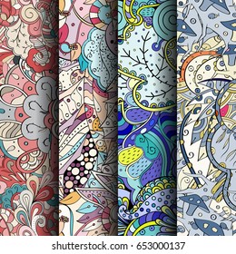 Set of tracery colorful seamless patterns. Vertical stripes. Curved doodling backgrounds for textile or printing with mehndi and ethnic motives. Vector