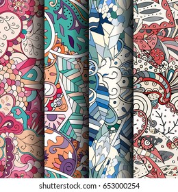 Set of tracery colorful seamless patterns. Vertical stripes. Curved doodling backgrounds for textile or printing with mehndi and ethnic motives. Vector