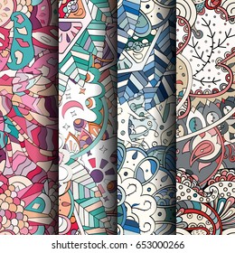 Set of tracery colorful seamless patterns. Vertical stripes. Curved doodling backgrounds for textile or printing with mehndi and ethnic motives. Vector