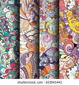 Set of tracery colorful seamless patterns. Vertical stripes. Curved doodling backgrounds for textile or printing with mehndi and ethnic motives. Vector