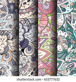 Set of tracery colorful seamless patterns. Vertical stripes. Curved doodling backgrounds for textile or printing with mehndi and ethnic motives. Vector