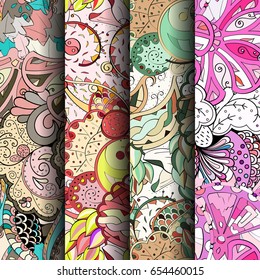 Set of tracery colorful seamless patterns. Vertical stripes. Curved doodling backgrounds for textile or printing with mehndi and ethnic motives. Vector