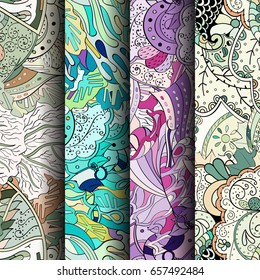 Set of tracery colorful seamless patterns. Vertical stripes. Curved doodling backgrounds for textile or printing with mehndi and ethnic motives. Vector