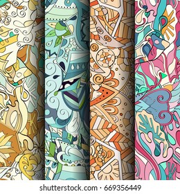 Set of tracery colorful seamless patterns. Vertical stripes. Curved doodling backgrounds for textile or printing with mehndi and ethnic motives. Vector