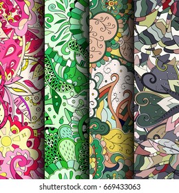 Set of tracery colorful seamless patterns. Vertical stripes. Curved doodling backgrounds for textile or printing with mehndi and ethnic motives. Vector