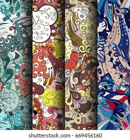 Set of tracery colorful seamless patterns. Vertical stripes. Curved doodling backgrounds for textile or printing with mehndi and ethnic motives. Vector