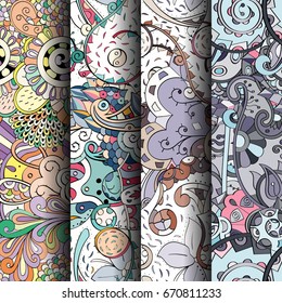 Set of tracery colorful seamless patterns. Vertical stripes. Curved doodling backgrounds for textile or printing with mehndi and ethnic motives. Vector