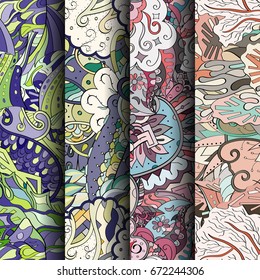 Set of tracery colorful seamless patterns. Vertical stripes. Curved doodling backgrounds for textile or printing with mehndi and ethnic motives. Vector