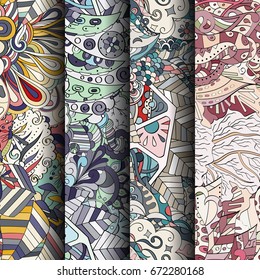 Set of tracery colorful seamless patterns. Vertical stripes. Curved doodling backgrounds for textile or printing with mehndi and ethnic motives. Vector