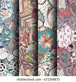 Set of tracery colorful seamless patterns. Vertical stripes. Curved doodling backgrounds for textile or printing with mehndi and ethnic motives. Vector